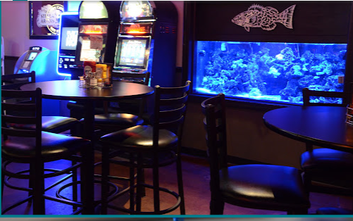 Installed saltwater aquarium enhancing a restaurant space